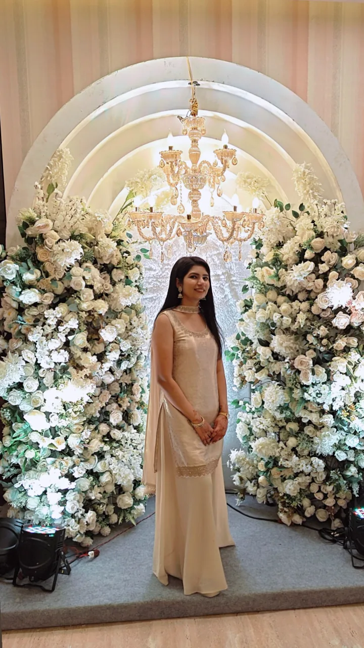 Ritika, the youngest sister and digital marketing lead, at a wedding venue